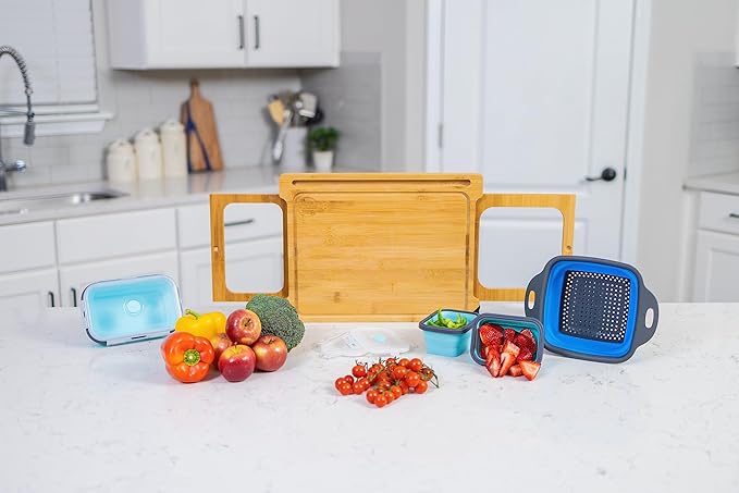 A cutting board with built-in containers and a strainer for efficient food prep, featuring a sleek design and organized layout.